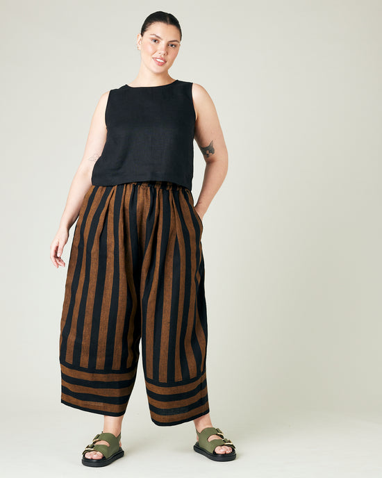 model wears rust stripe bobbi trousers