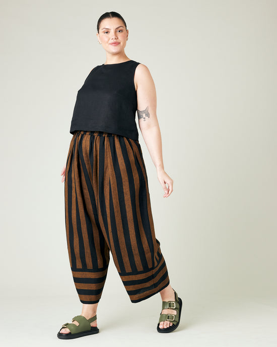 model wears rust stripe bobbi trousers