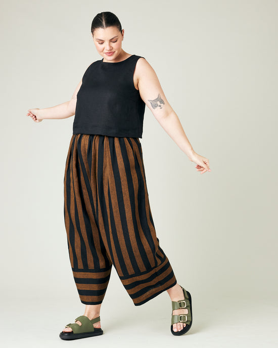 model wears rust stripe bobbi trousers