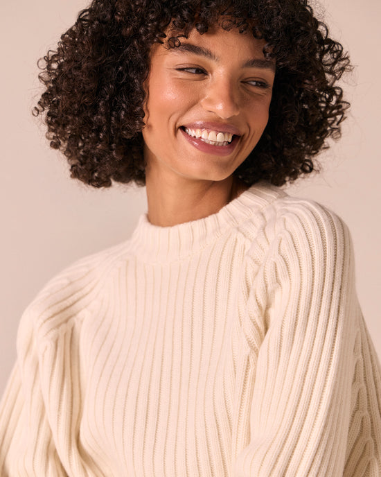 model wears cadi bone knitted jumper