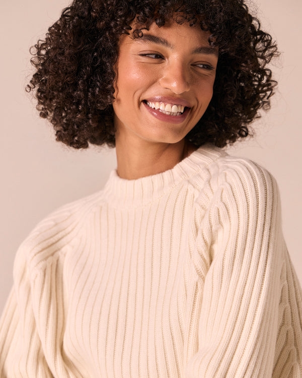 model wears cadi bone knitted jumper
