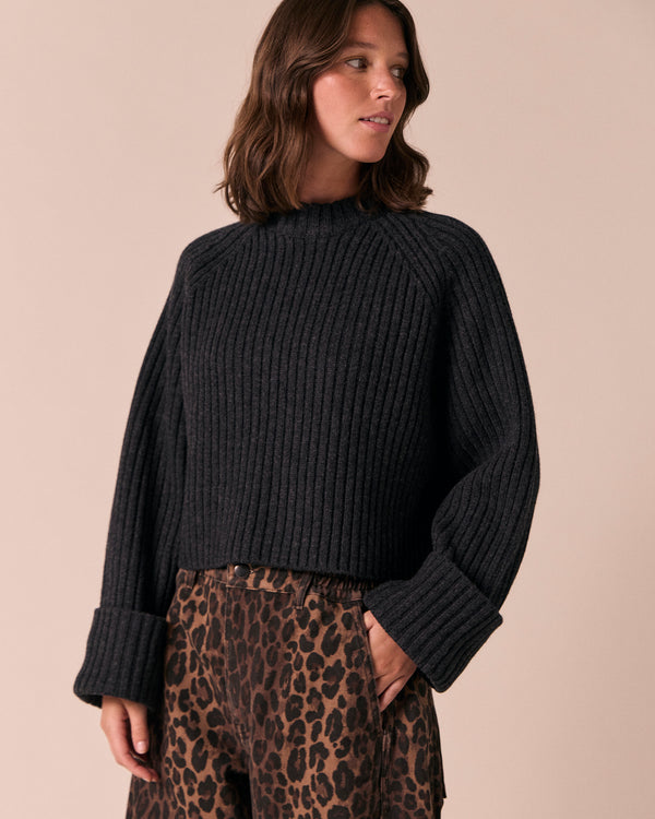 model wears cadi charcoal knitted jumper
