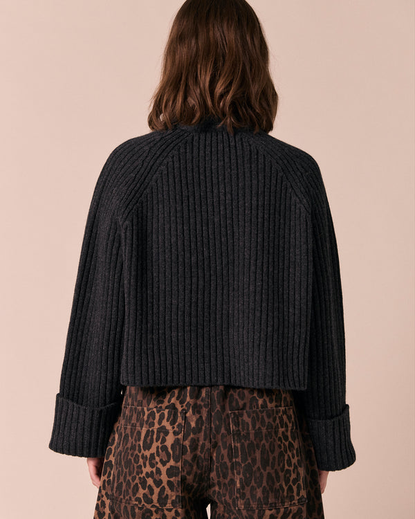 model wears cadi charcoal knitted jumper