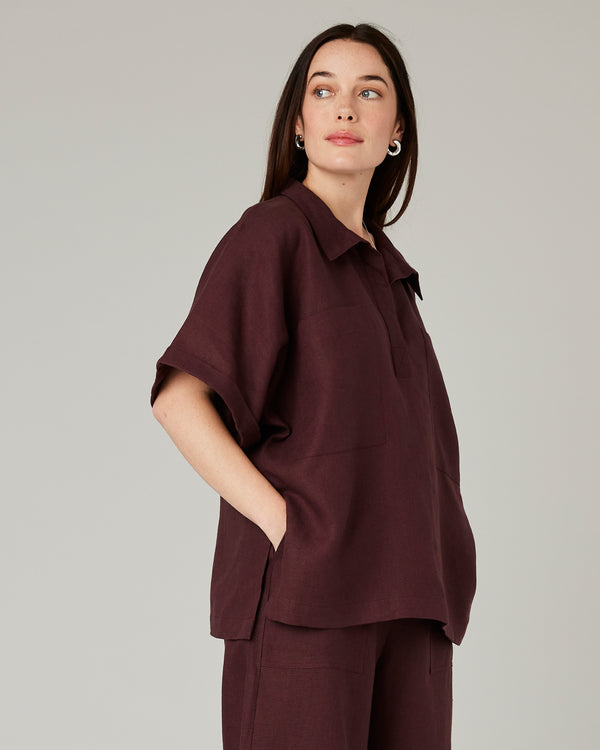 model wears burgundy linen cara shirt