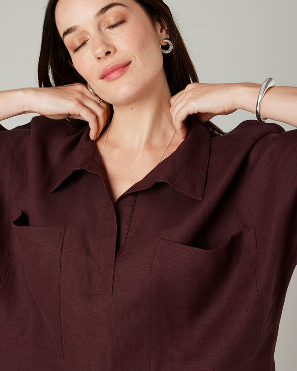 model wears burgundy linen cara shirt