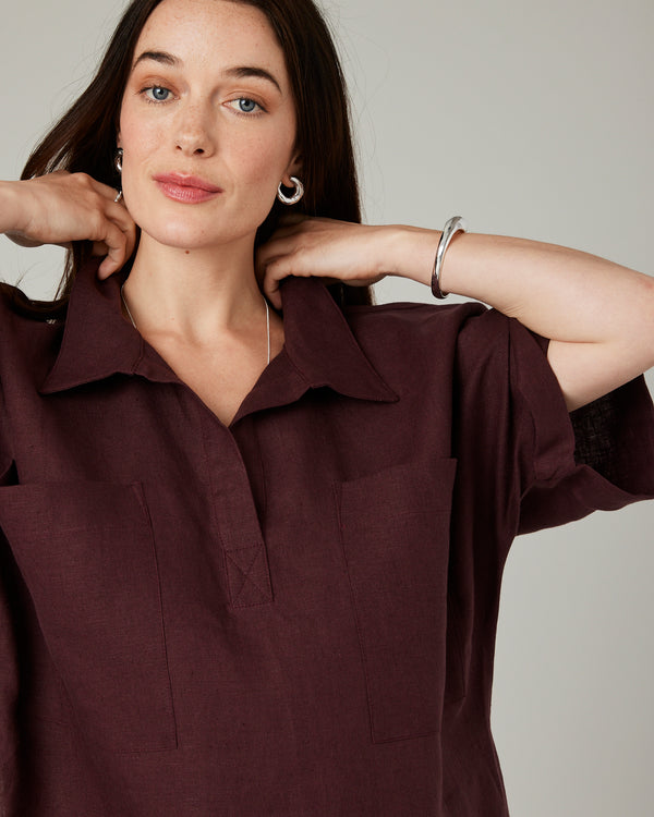 model wears burgundy linen cara shirt