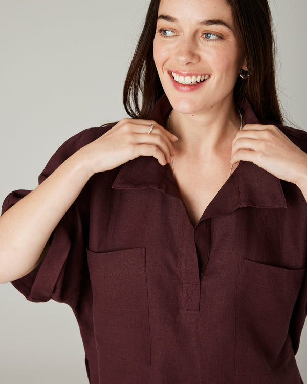 model wears burgundy linen cara shirt