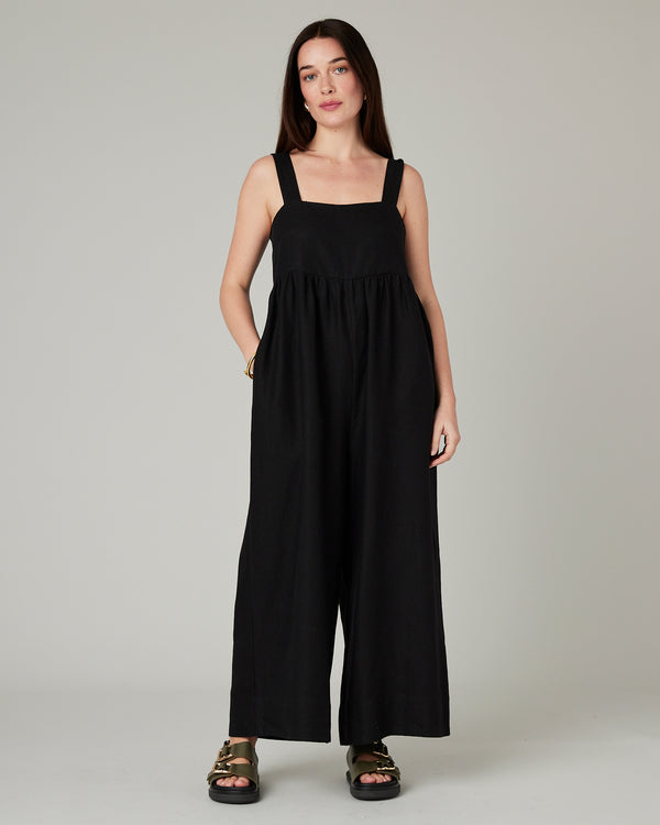 model wears black cari linen jumpsuit