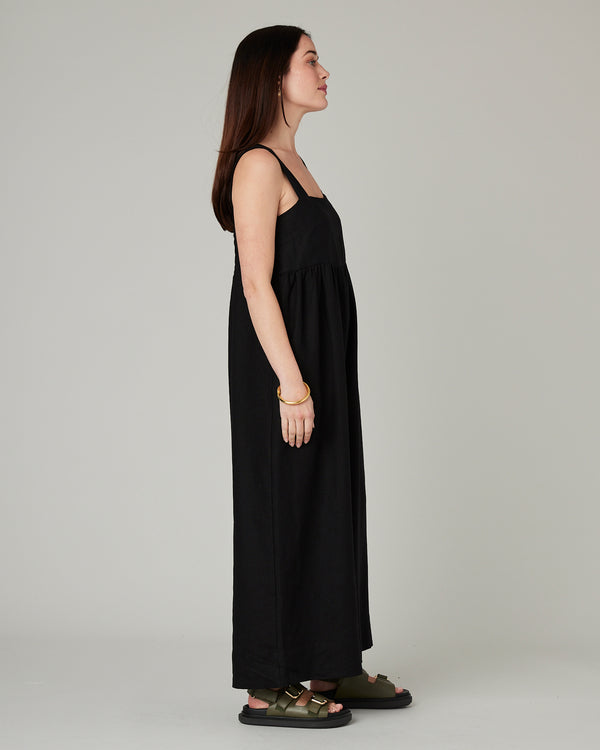 model wears black cari linen jumpsuit