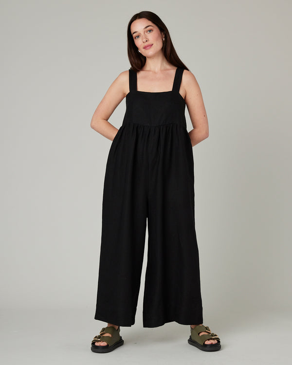 model wears black cari linen jumpsuit