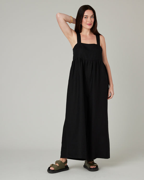 model wears black cari linen jumpsuit