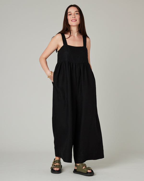 model wears black cari linen jumpsuit