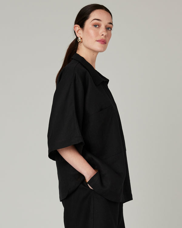 model wears black linen cara shirt 