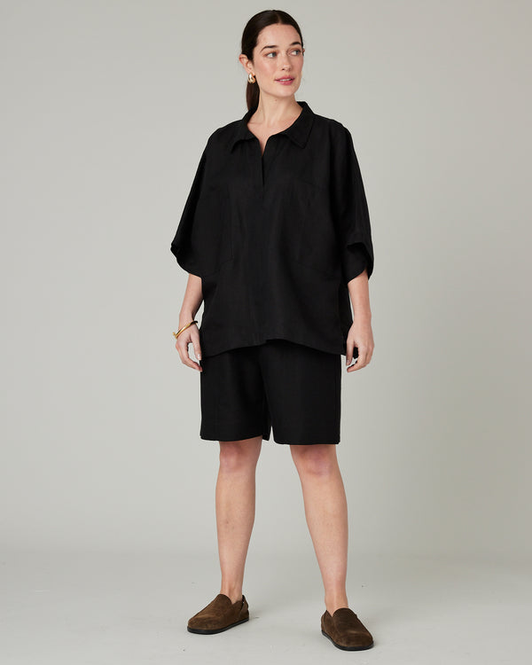 model wears black linen cara shirt 