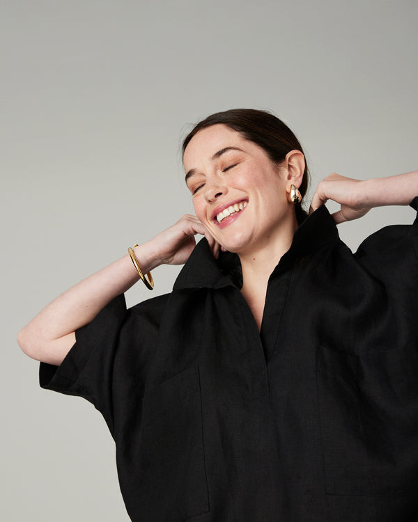 model wears black linen cara shirt 