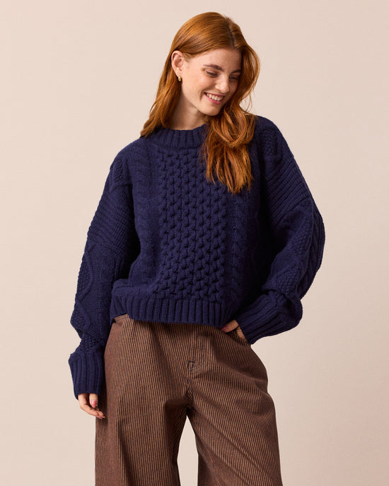 model wears carly navy knitted jumper