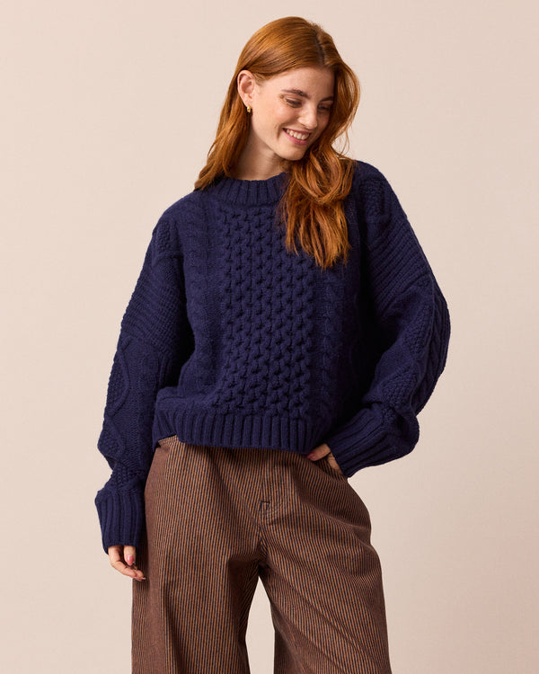 model wears carly navy knitted jumper