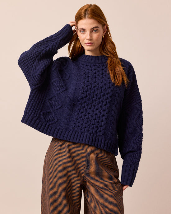 model wears carly navy knitted jumper