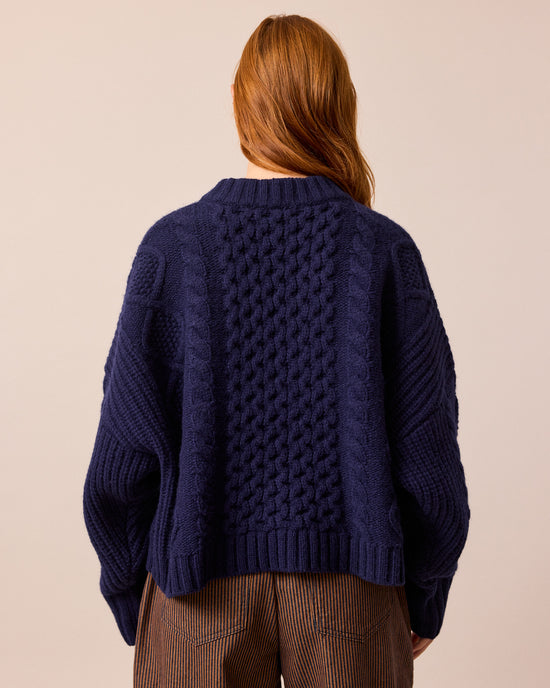 model wears carly navy knitted jumper