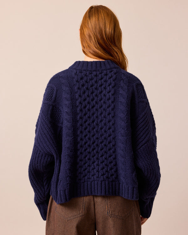 model wears carly navy knitted jumper