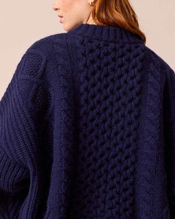 model wears carly navy knitted jumper