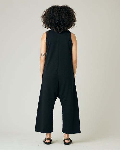 model wears black jersey cassie jumpsuit