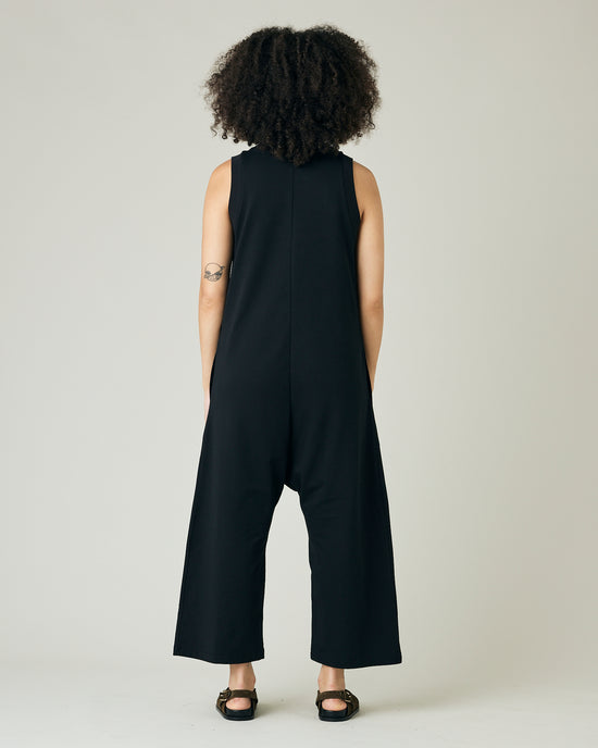 model wears black jersey cassie jumpsuit