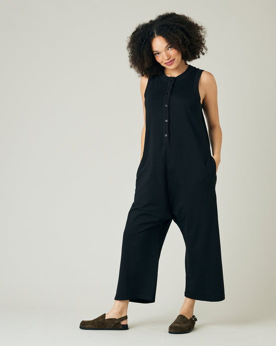 model wears black jersey cassie jumpsuit