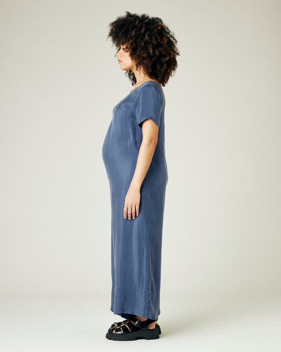 pregnant model wears blue cupro celine jumpsuit