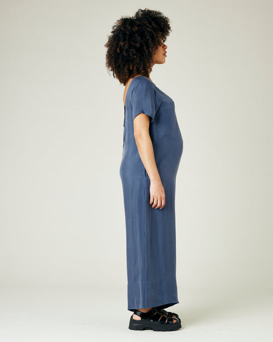 pregnant model wears blue cupro celine jumpsuit