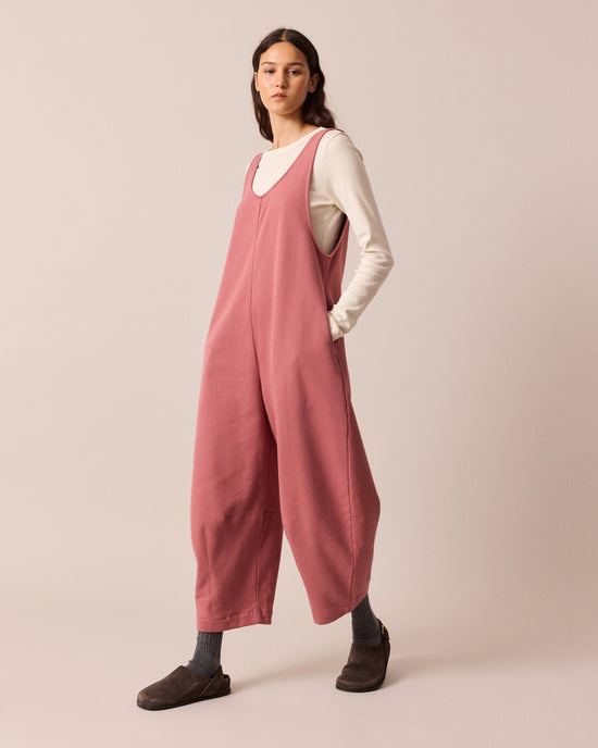 model wears clover dusty pink jersey jumpsuit
