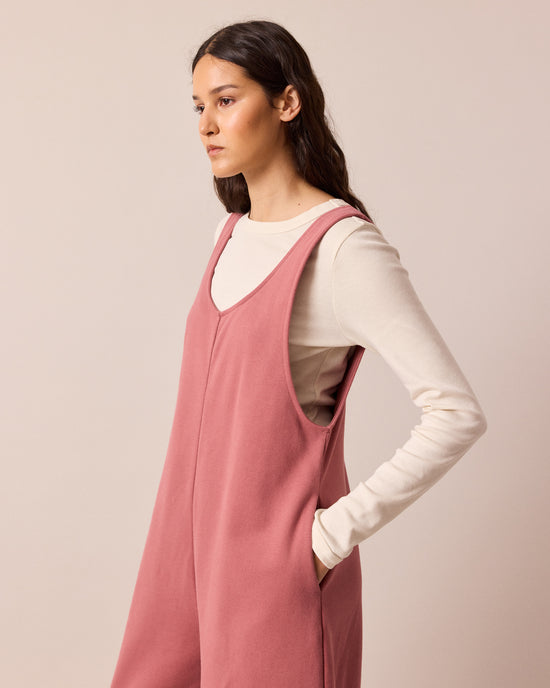 model wears clover dusty pink jersey jumpsuit