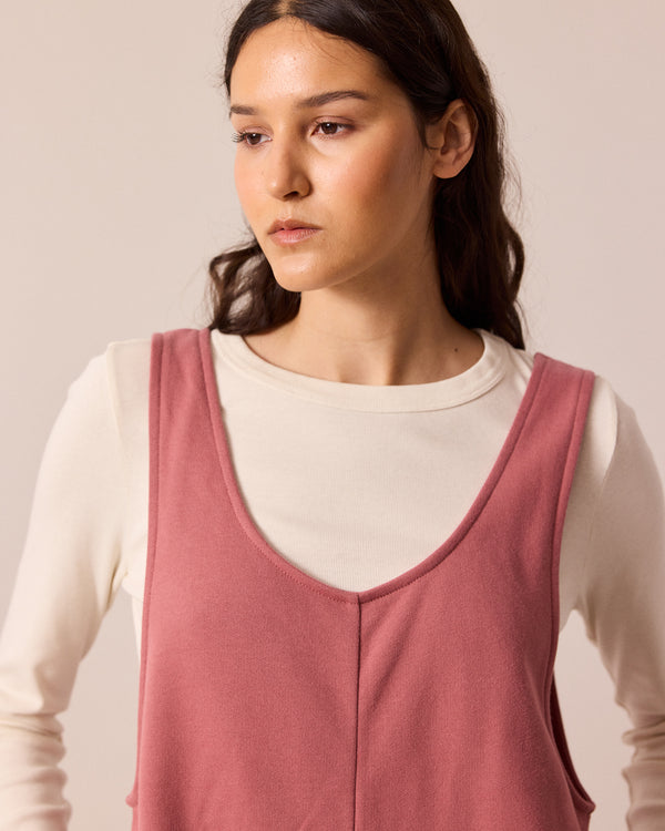 model wears clover dusty pink jersey jumpsuit