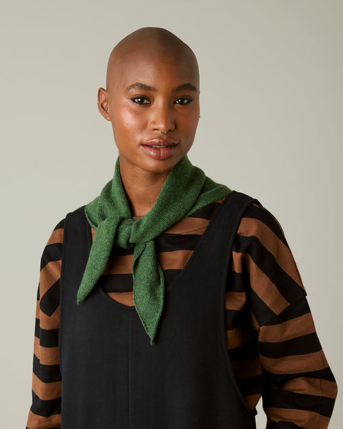 model wears knitted apple green neckerchief