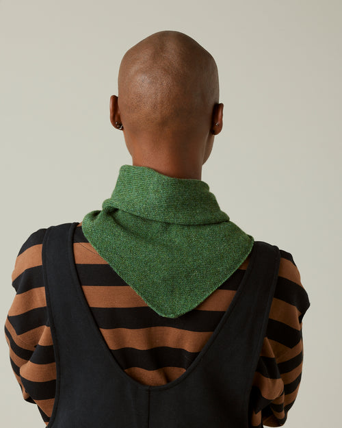 model wears knitted apple green neckerchief