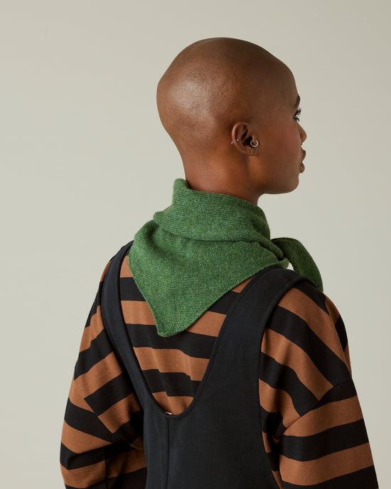 model wears knitted apple green neckerchief