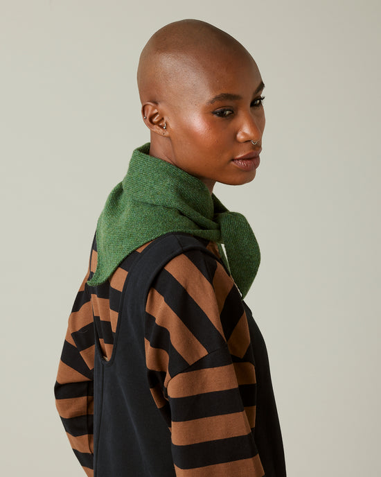 model wears knitted apple green neckerchief