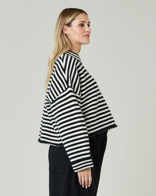 pregnant model wears black and ivory stripe coco