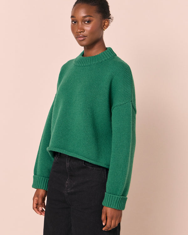 model wears coco emerald knitted jumper