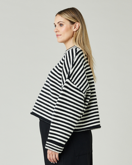 pregnant model wears black and ivory stripe coco