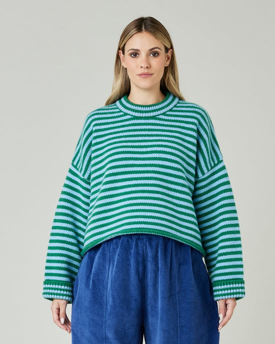 pregnant model wears blue and green stripe coco