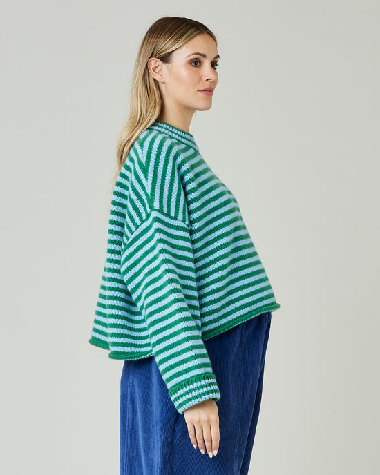 pregnant model wears blue and green stripe coco