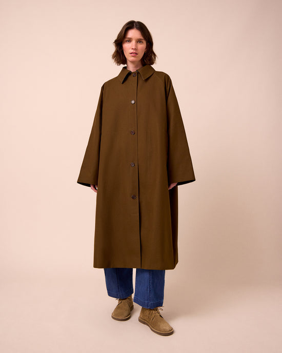 model wears collette hazel trench coat