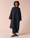 model wears collette navy coated cotton trench coat