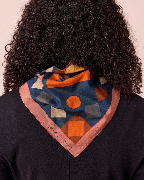 model wears diamond patchwork cotton neckerchief