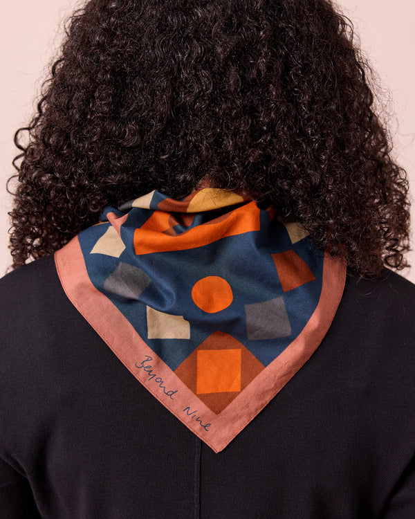 model wears diamond patchwork cotton neckerchief
