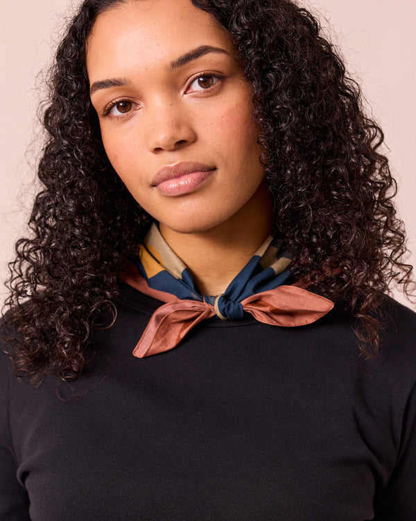 model wears diamond patchwork cotton neckerchief
