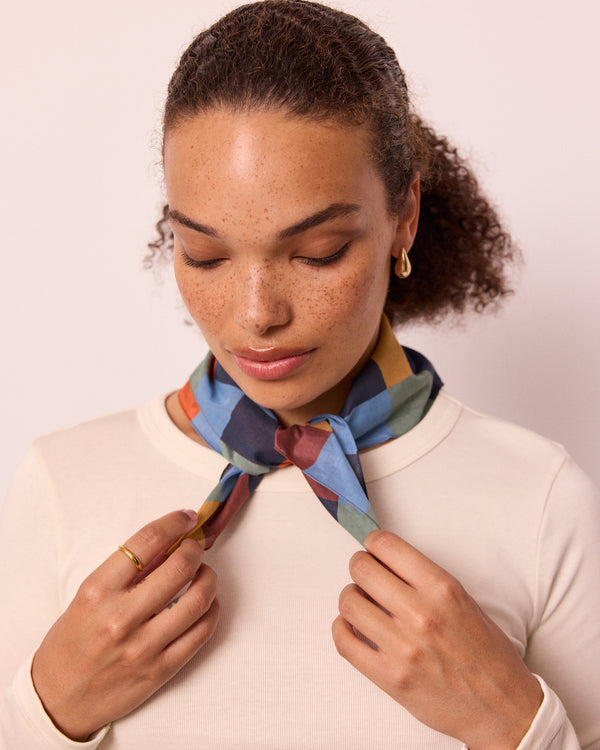 model wears cotton neckerchief garden checkerboard
