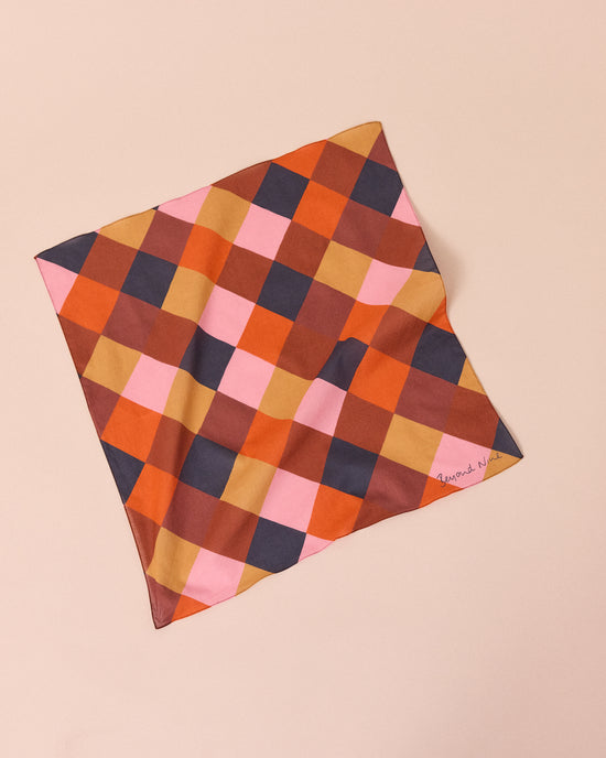 model wears neckerchief sunset harlequin neckerchief