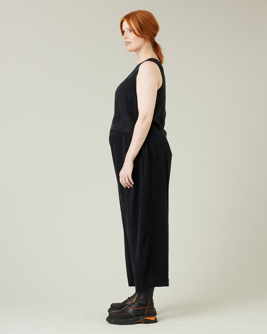 pregnant model wears black self leopard cupro mabel trousers